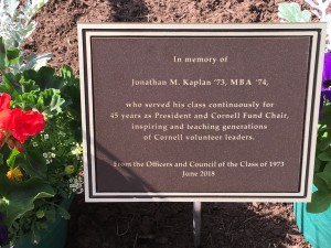 Memorial plaque at the bike rack outside Sage Hall